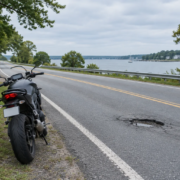 Annapolis pothole and motorcycle scene illustrating a Maryland motorcycle accident pothole claim