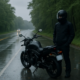 Wet road motorcycle accident lawyer Annapolis scene showing rain, standing water, and a motorcycle